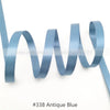 A blue satin ribbon is shown in a wavy line against a white background.