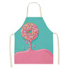 A bright teal apron with a pink dripping donut design.