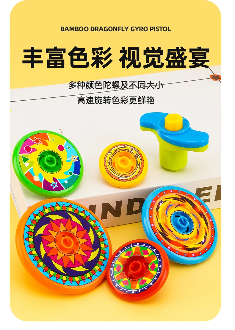 A collection of colorful bamboo dragonfly gyro pistols and spinning tops displayed on a white box.