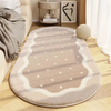 A beige decorative area rug with subtle gray stripes and white accents placed on a light wood floor.