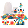A collection of colorful wooden puzzle pieces shaped like houses and birds, with a white fabric bag and a card in the backgro