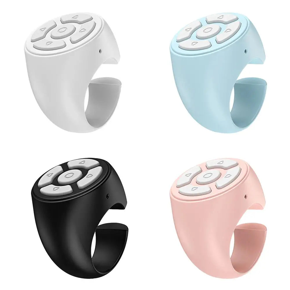 Four colored Bluetooth ring remote controls shown in different shades of white, light blue, black, and pink.