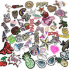 A collection of 30 assorted embroidered iron-on patches featuring various designs like hearts, stars, and text.