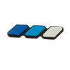 A set of three colored grille emblem stickers in blue, light blue, and white for Toyota trucks and SUVs