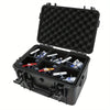 Portable hard shell toolbox with a black foam insert containing various tools