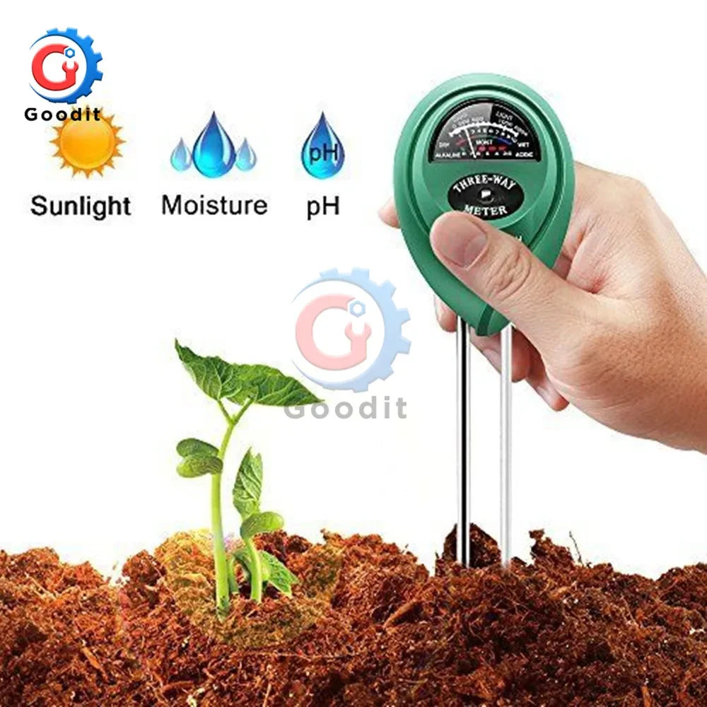A hand holds a green soil testing meter with three probes inserted into dark soil, demonstrating light, moisture, and pH meas