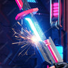 A futuristic sword blade glowing with intense light and sparks, featuring a pink and black design.