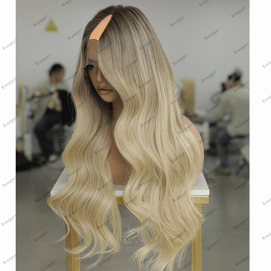 A long, blonde wig with a V-part and natural wavy texture displayed on a mannequin.