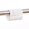 White silicone shower curtain rings coiled on a metal rod for bathroom decor