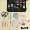 A compact portable sewing kit showing various hand sewing tools including scissors needles pins and a wheel