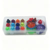A clear plastic storage box containing various colorful spinning top customization accessories.