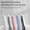 A display of five clear plastic retractable gel pens in various colors including white, silver, pink, blue, and black.