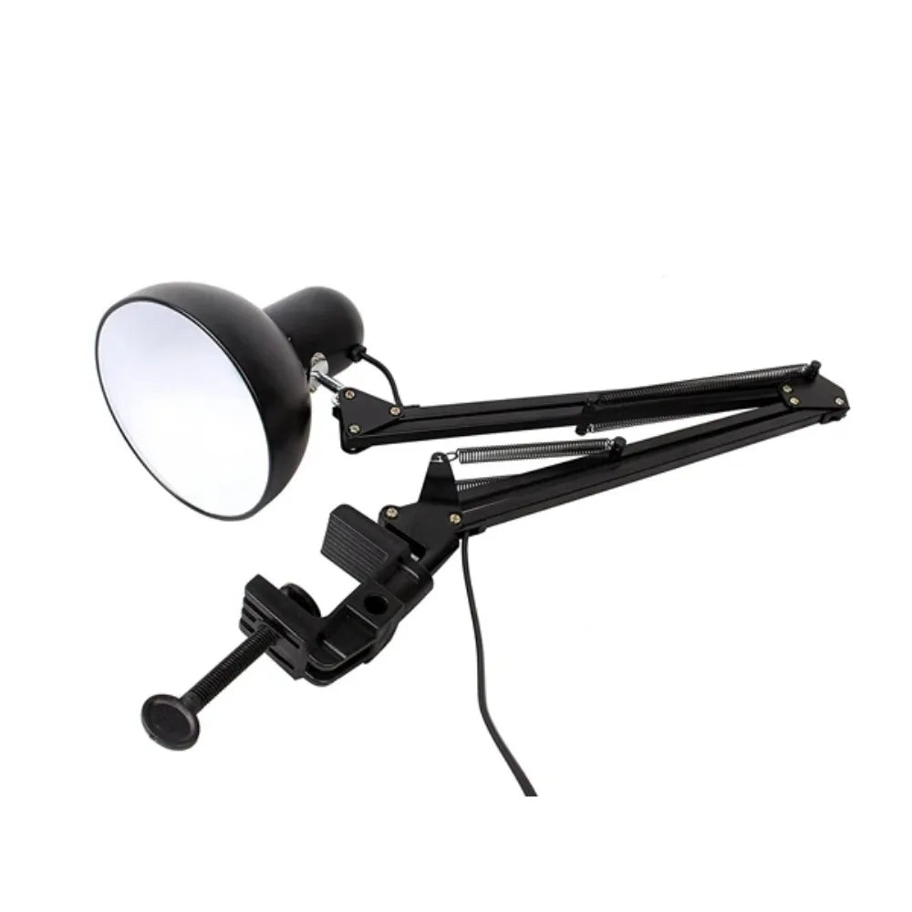 A black adjustable swing arm desk lamp with a spherical reflector and clamp mount.