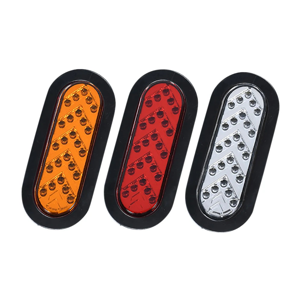 Three oval LED trailer tail lights in amber, red, and white with dynamic turn signals
