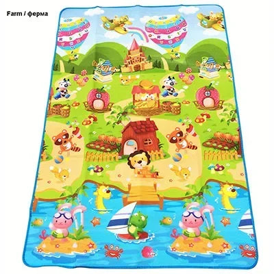 A colorful play mat featuring farm animal designs for baby play.