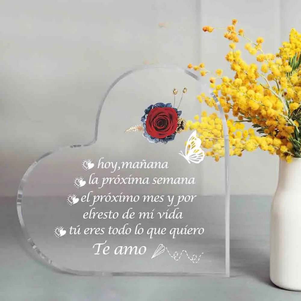 Clear acrylic heart plaque engraved with a red rose and Spanish text expressing love
