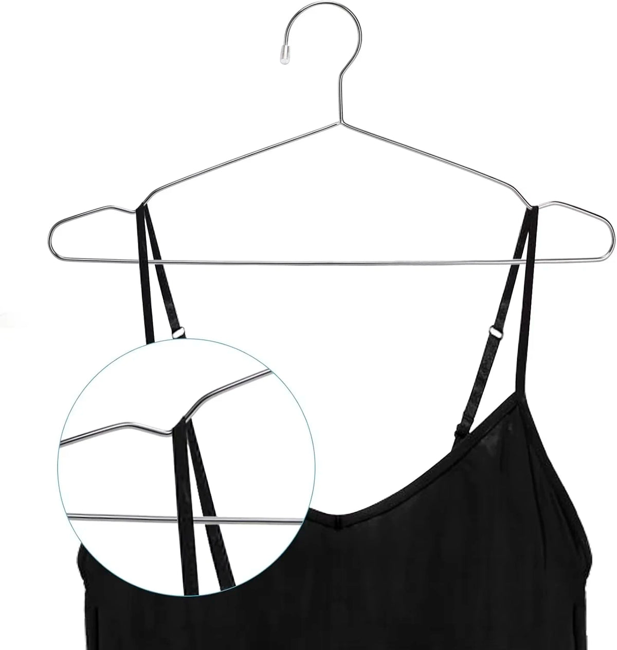 A black camisole top hanging on a stainless steel wire clothes hanger.