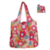 A pink and floral patterned reusable nylon shopping tote bag with a small matching pouch.