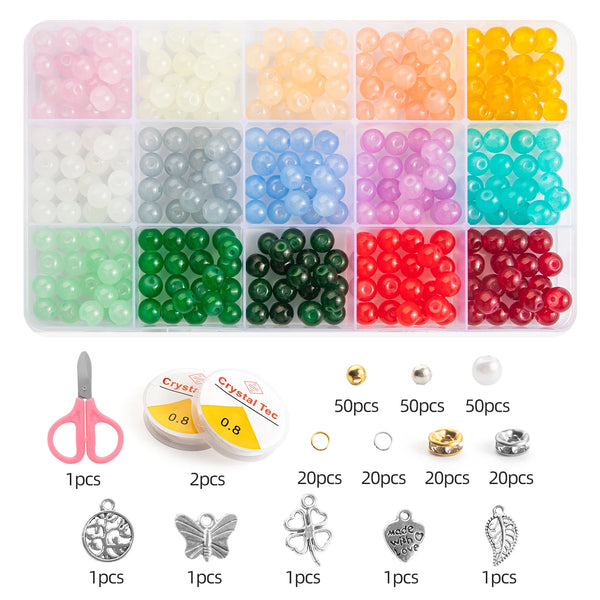 A glass bead jewelry making kit featuring various colors of beads and tools including pliers and findings.