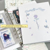 A photo album featuring butterfly and rose designs for K-Pop cards and memories