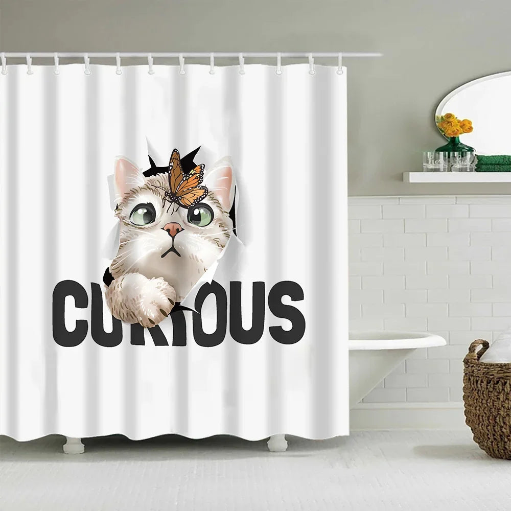 A white shower curtain featuring a cute cartoon cat face with butterfly wings and the word CURIOUS in black text.
