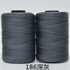 Two spools of dark gray 3-ply polyester knitting yarn for crochet and hand crafts