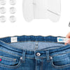 A set of adjustable invisible belt tightener clips and a sewing needle shown next to a pair of blue denim jeans.