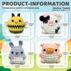 A set of three crochet amigurumi animals including a bee, a pig, and a rabbit.