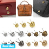 A collection of metal bag bottom feet studs for leather craft protection in various finishes.