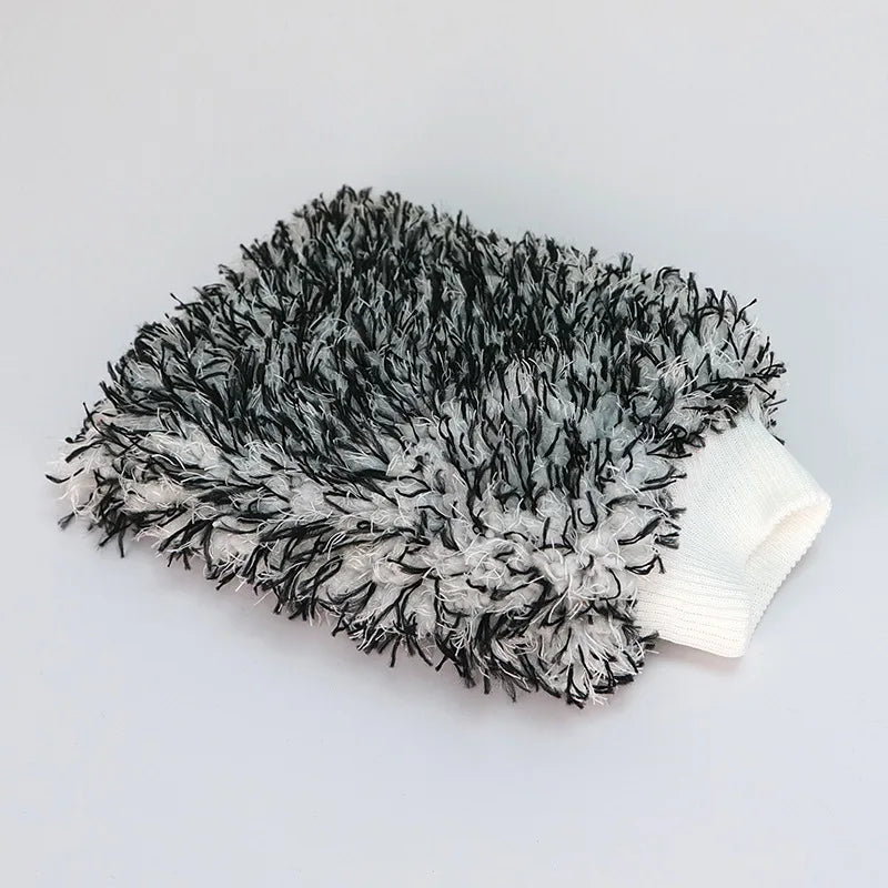 A black and gray microfiber car wash mitt with a white cuff.