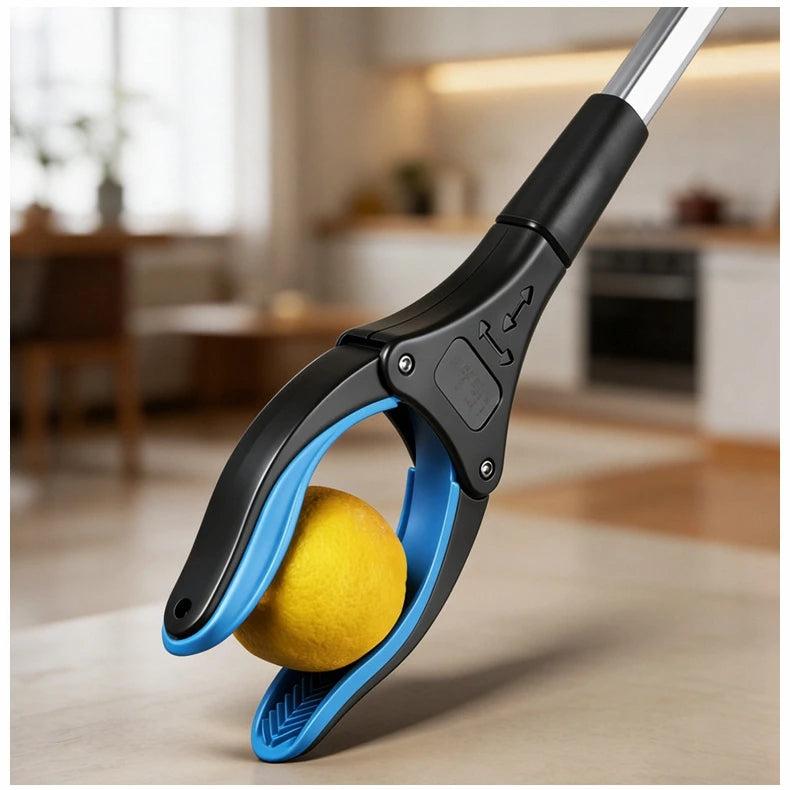 A close-up of a black and blue foldable grabber tool with a yellow ball being picked up.