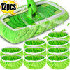 A set of twelve reusable green microfiber mop pads for wet and dry cleaning.