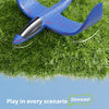 A blue foam airplane toy is shown landing on green grass, demonstrating all-round protection for a child.