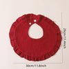 A red knitted baby bib with a ruffled trim shown flat, measuring 29cm wide.