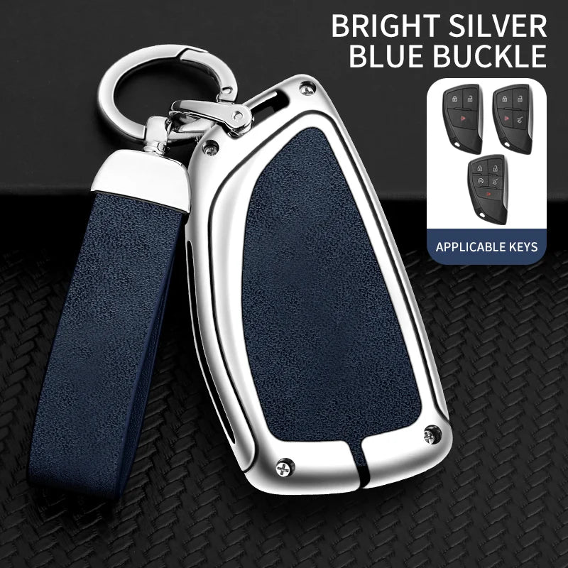 A bright silver blue buckle car key case with a leather strap and multiple keys displayed on a black background.