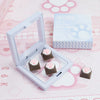 A clear plastic case holds silicone cat paw keycaps and a box for MX switches.