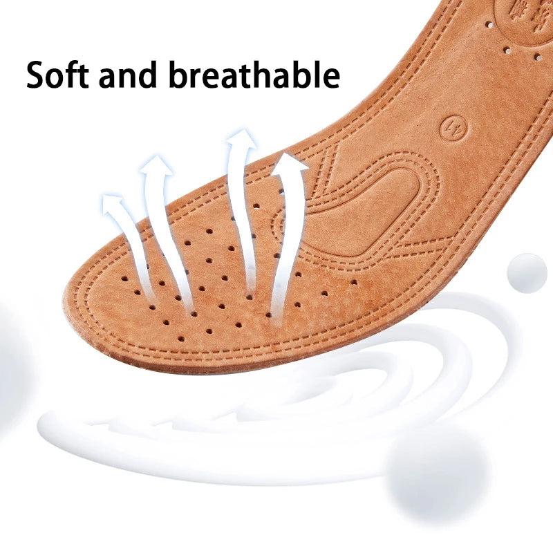 A close-up view of a tan leather insole showing airflow arrows, highlighting its soft and breathable features.