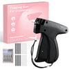 A black handheld tagging gun for clothing repairs is shown next to its packaging and various needle components.