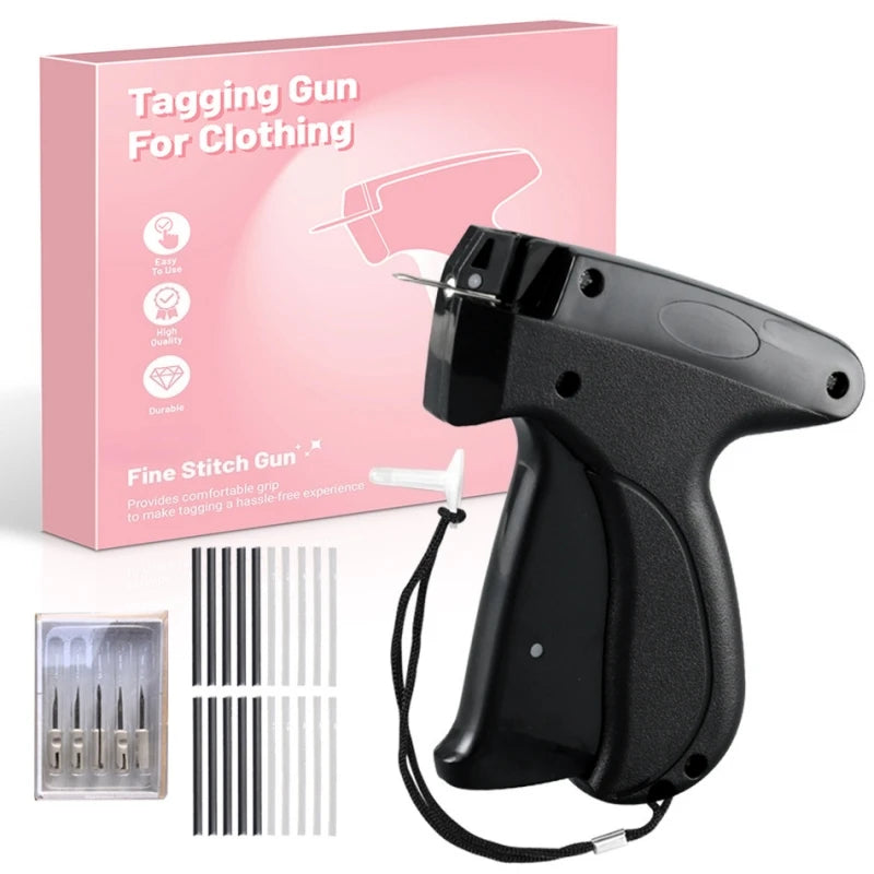 A black handheld tagging gun for clothing repairs is shown next to its packaging and various needle components.