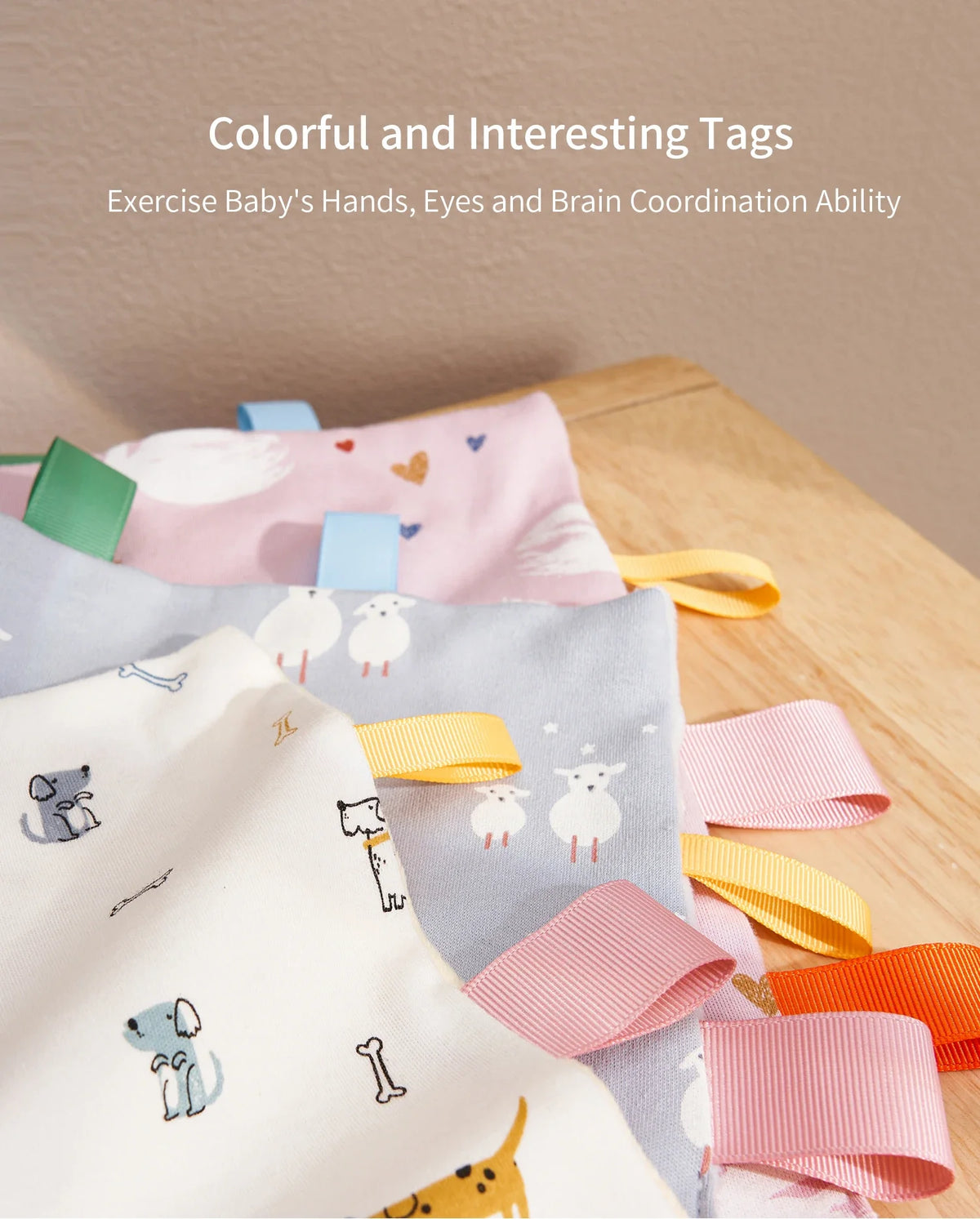 Colorful and interesting tags on a baby sensory comfort blanket for exercising hands, eyes, and brain coordination.