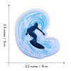 Embroidered sea wave iron-on patch featuring a silhouette of a person within a blue wave design