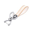 Silver key fob with a translucent pink and white TPU cover and a metal split ring.