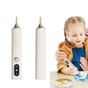 A young girl is using a white wireless electric diamond art pen with vacuum suction on a piece of paper.