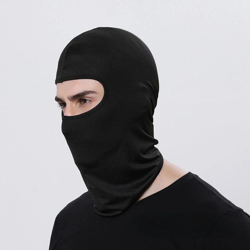 A black windproof full face balaclava worn by a person.