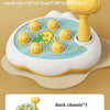 A small yellow duck-themed pounding toy with a hammer, featuring multiple animal figures.