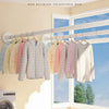 A close-up of a non-puching telescopic rod used for hanging clothes in a bright room.
