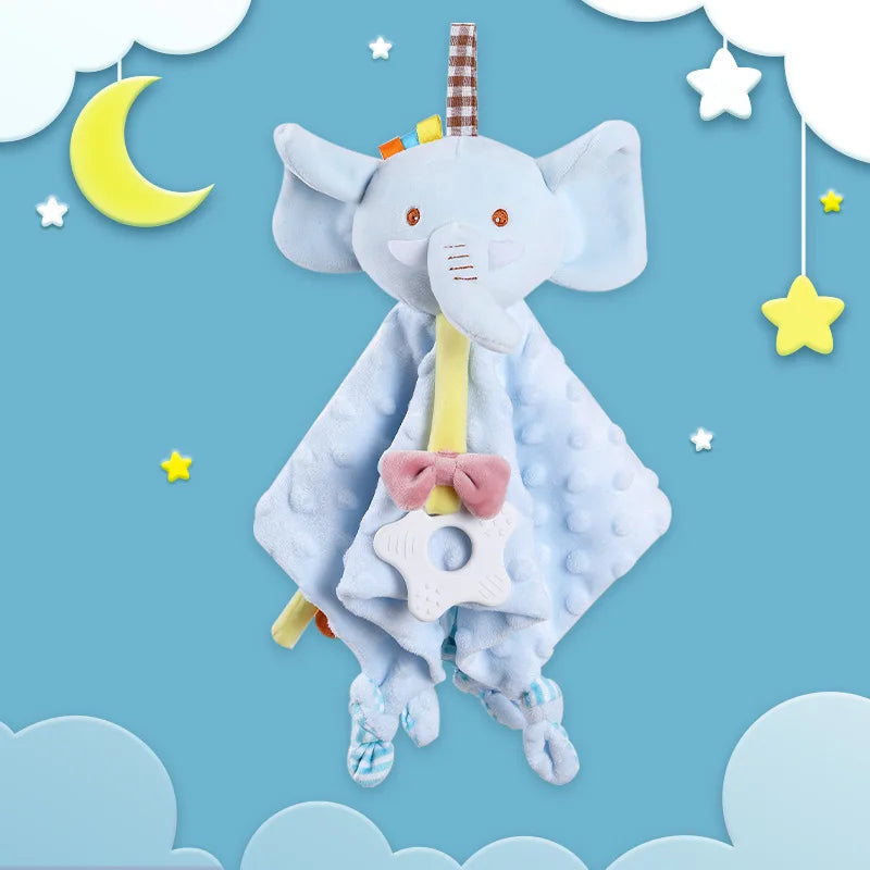 A light blue elephant plush toy with a teether, rattle, and comfort blanket floating among clouds and stars.