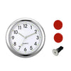 A silver mini car vent quartz clock with luminous hands and red buttons.