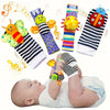 A set of soft teether booties and socks for babies featuring various sensory toys like rattles and rings.