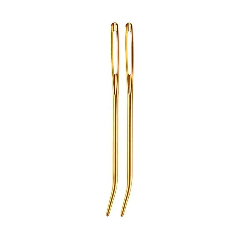 A pair of gold-colored bent tip tapestry needles for knitting and weaving.
